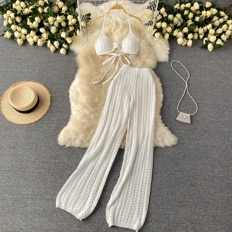 Wholesale 2026 Summer Seaside Holiday Suit Sexy Bikini Strap Halter Top Hollow Knitted Wide Leg Pants OL Style Women's Sets