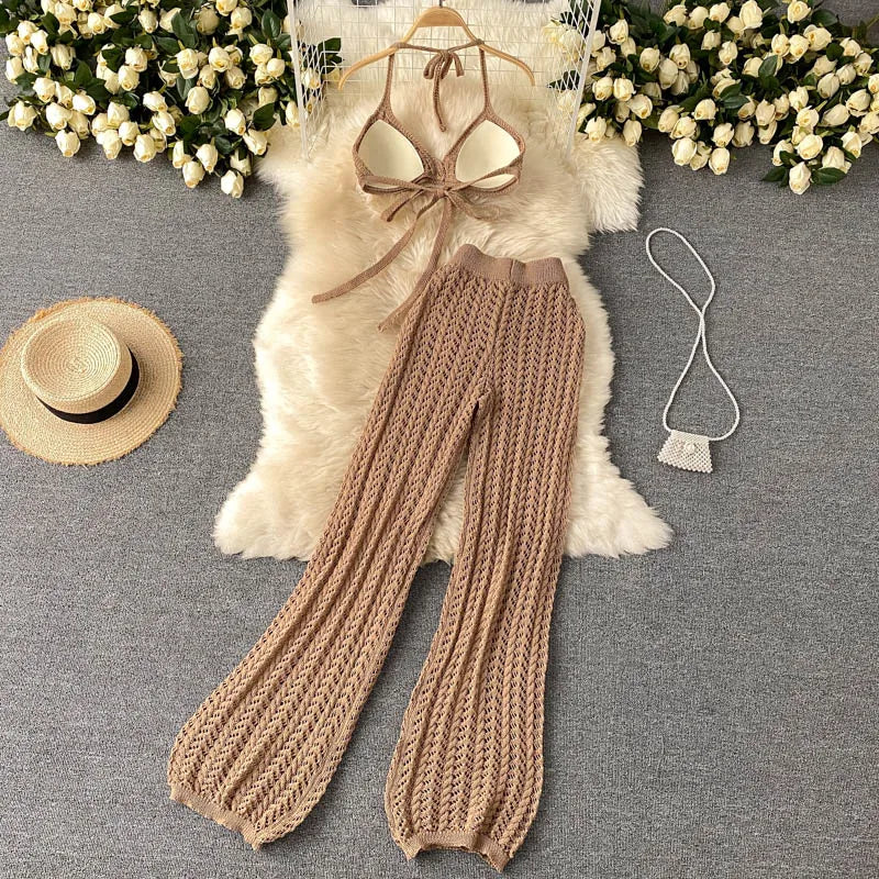 Wholesale 2026 Summer Seaside Holiday Suit Sexy Bikini Strap Halter Top Hollow Knitted Wide Leg Pants OL Style Women's Sets
