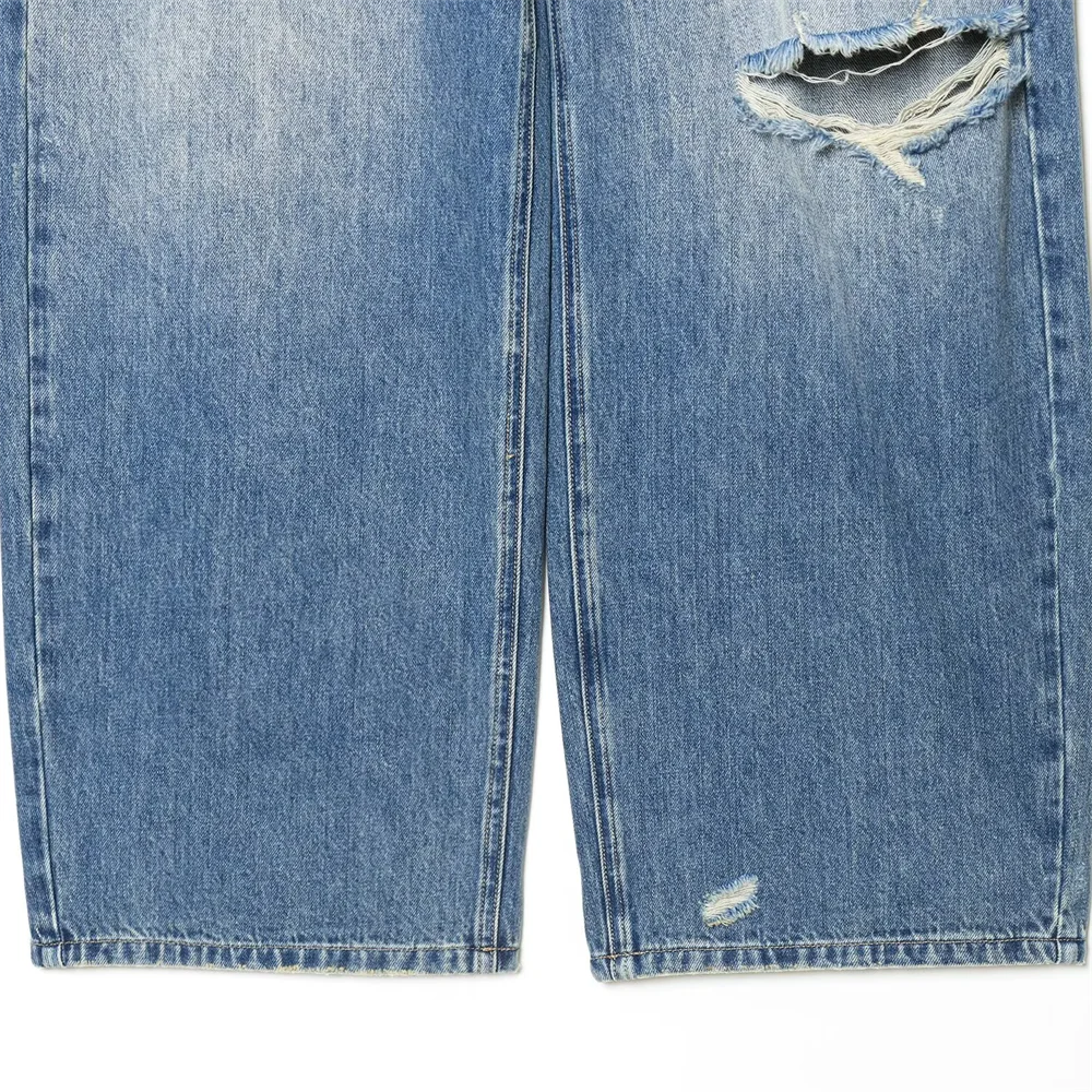 2026 new women's clothing French casual design with perforated details, mid waist folding waist jeans