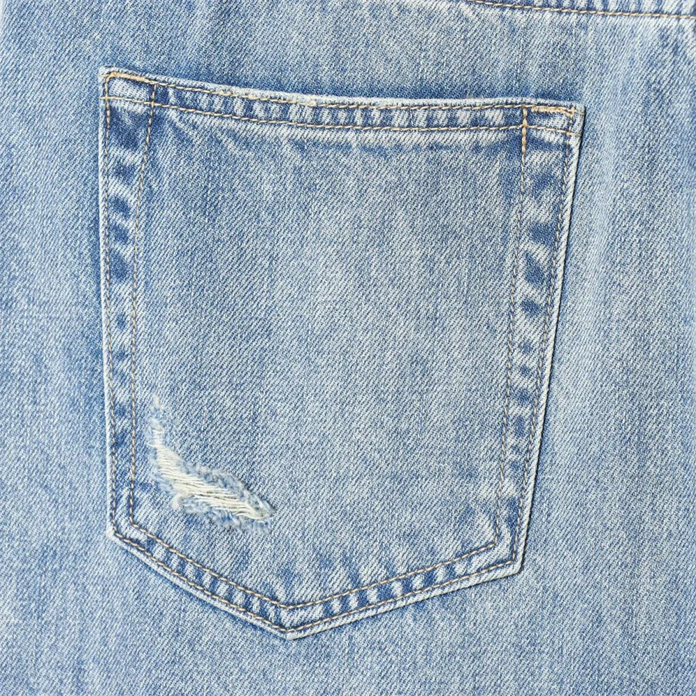 2026 new women's clothing French casual design with perforated details, mid waist folding waist jeans