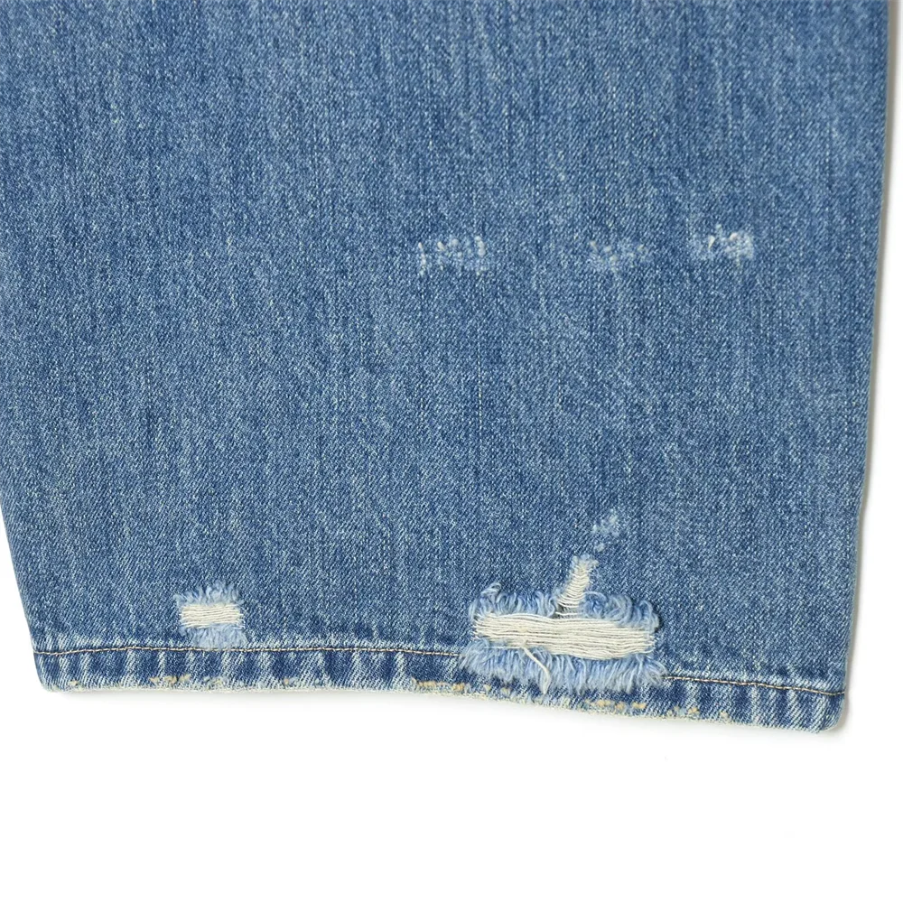 2026 new women's clothing French casual design with perforated details, mid waist folding waist jeans