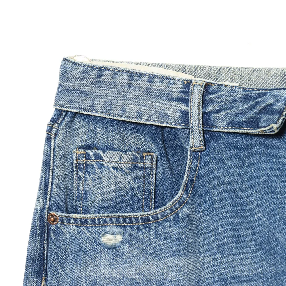 2026 new women's clothing French casual design with perforated details, mid waist folding waist jeans