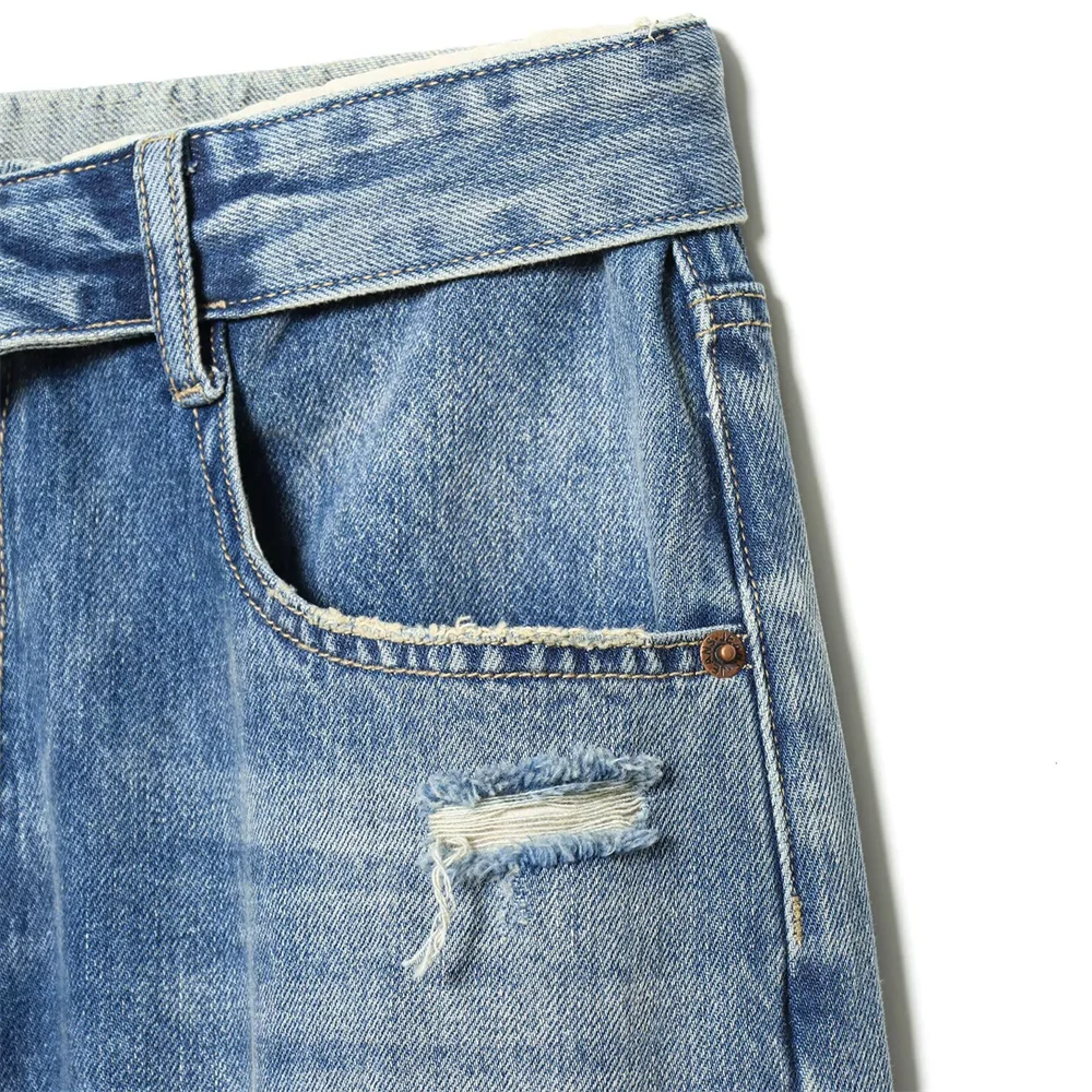 2026 new women's clothing French casual design with perforated details, mid waist folding waist jeans